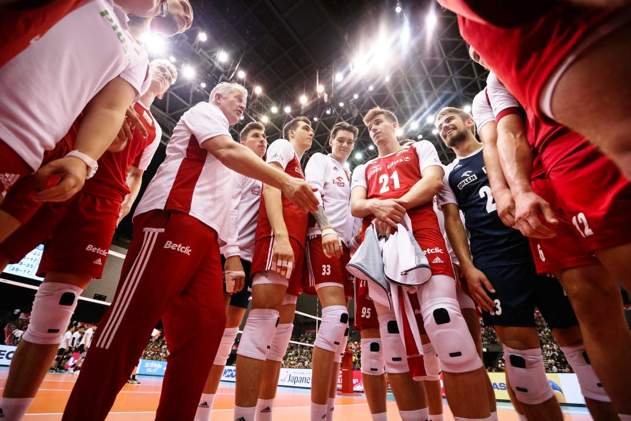 Poland coach Vital Heynen talks to his players